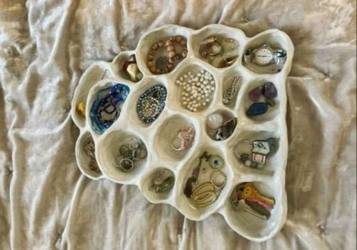 Handcrafted ceramic jewelry dish organizer with organic compartments for rings, earrings, and accessories created during the Jewelry Dishes & Ring Cone clay workshop at the Artist Outpost in Ocean Beach.